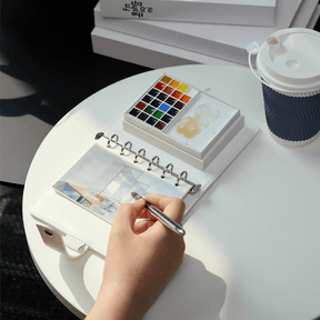 MEEDEN Travel Watercolor Sketch Set, 24 Colors Portable Painting Kit with Paper Brush Palette